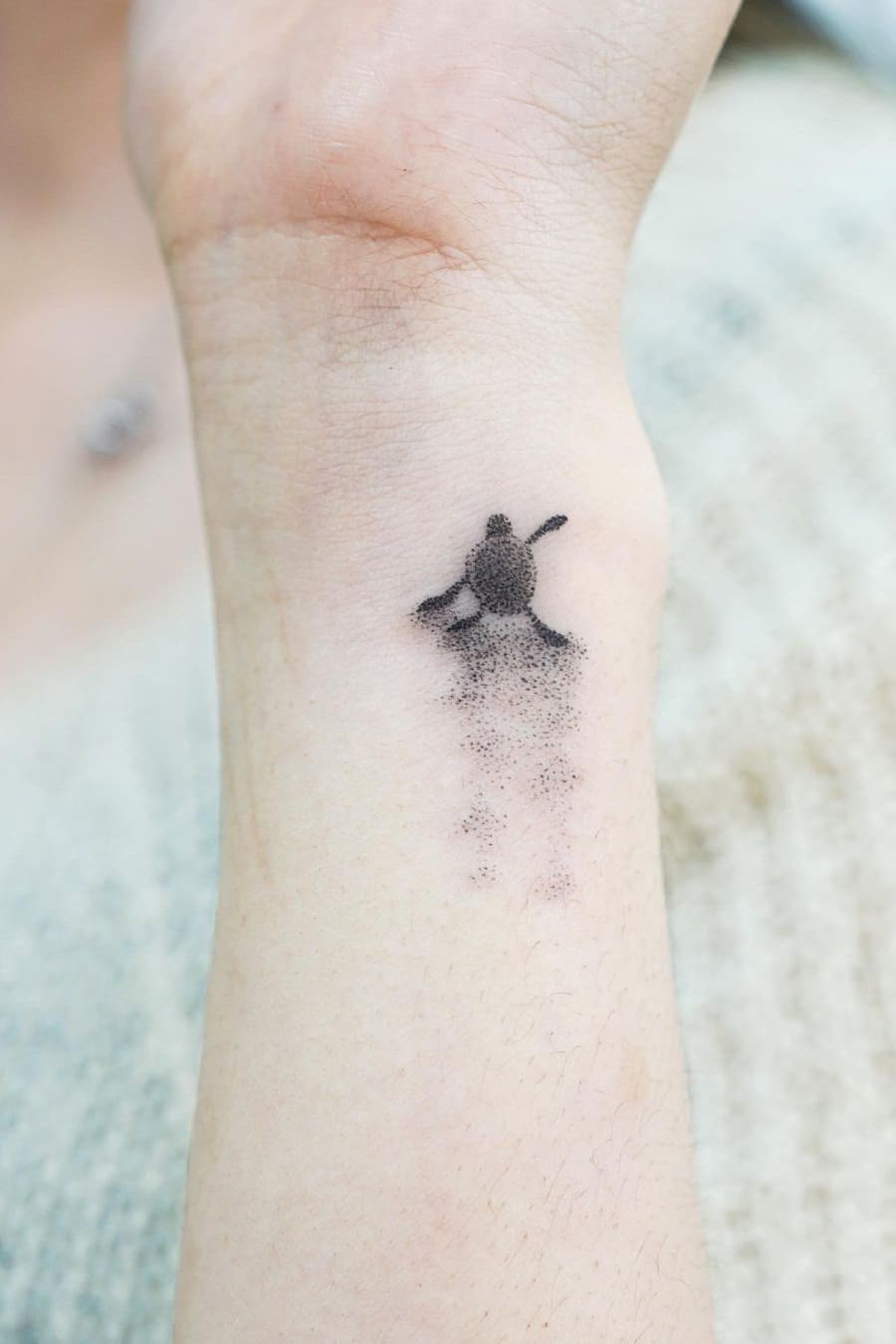 Tiny turtle tattoo