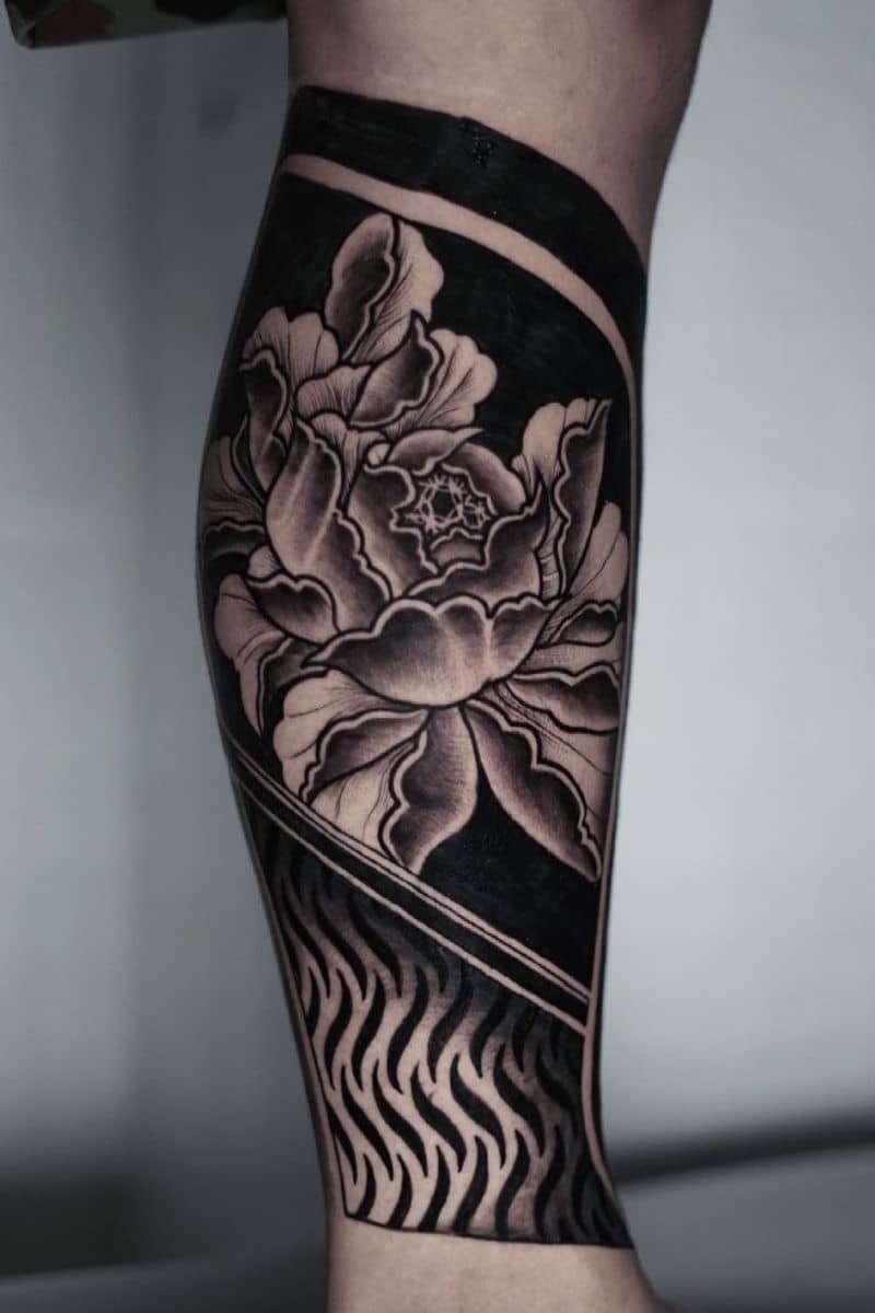 Tribal lotus tattoo