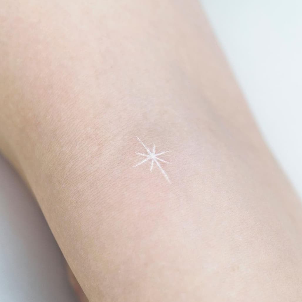 White star tattoo