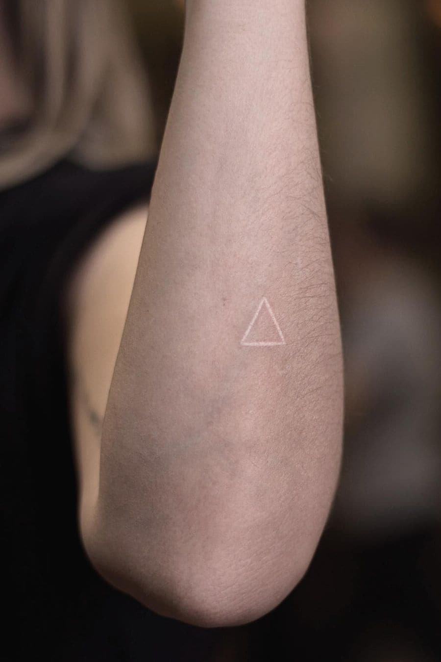 White triangle geometric tattoo