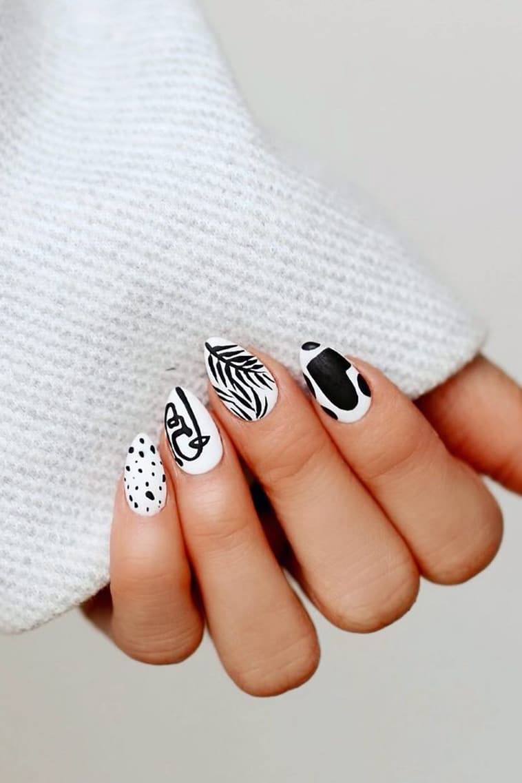 Black and white hand-painted art nails