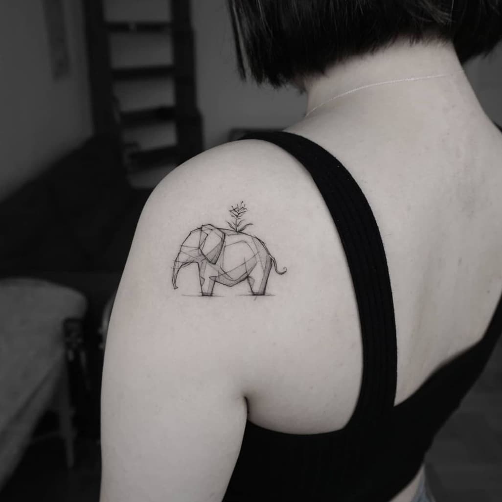 Manuscript Elephant Tattoo