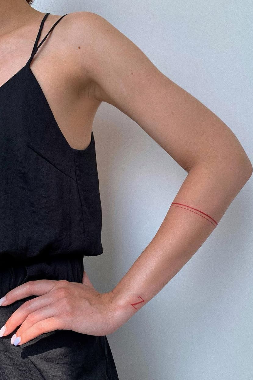 Minimalist red tattoo