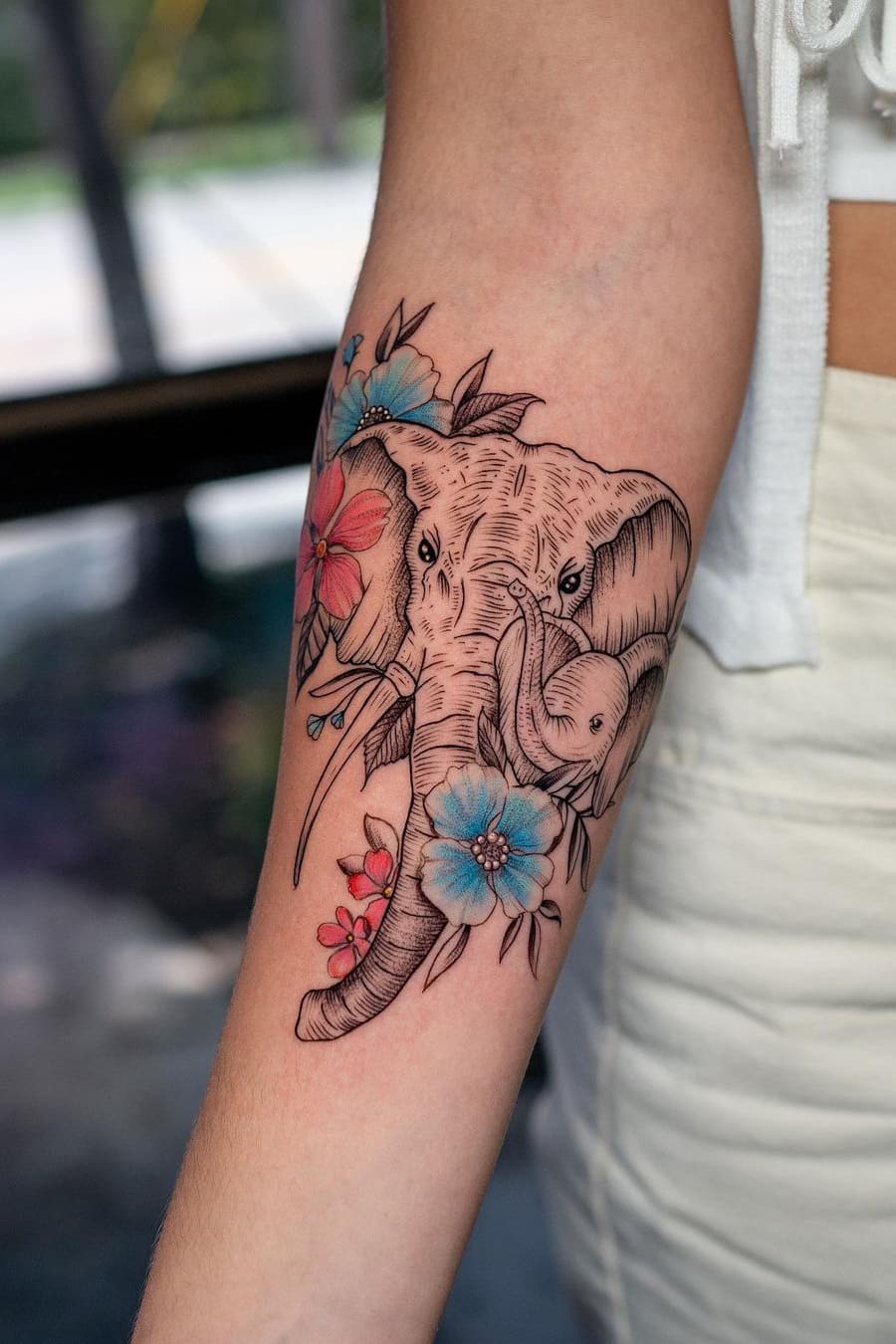 Mother and baby elephant tattoo