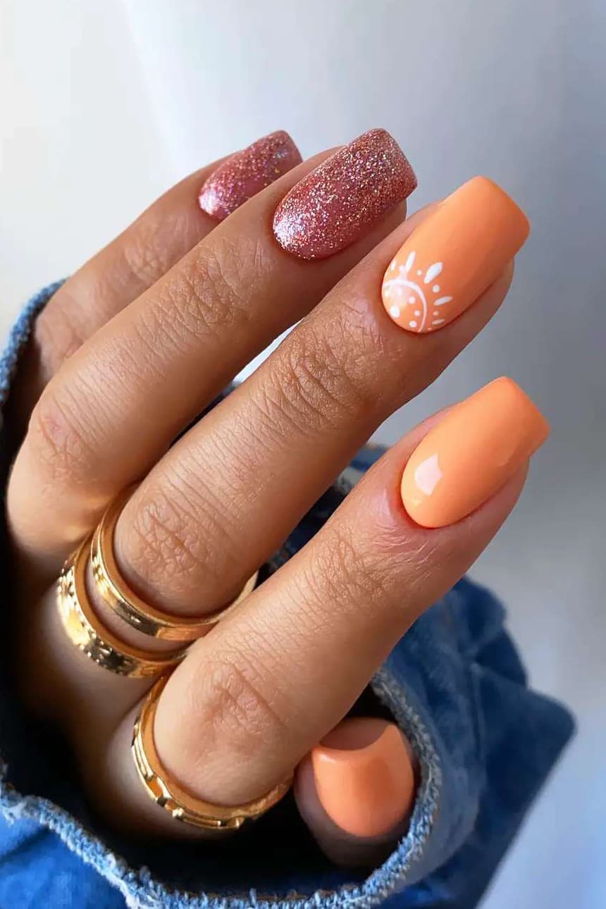 Orange and rose gold nails