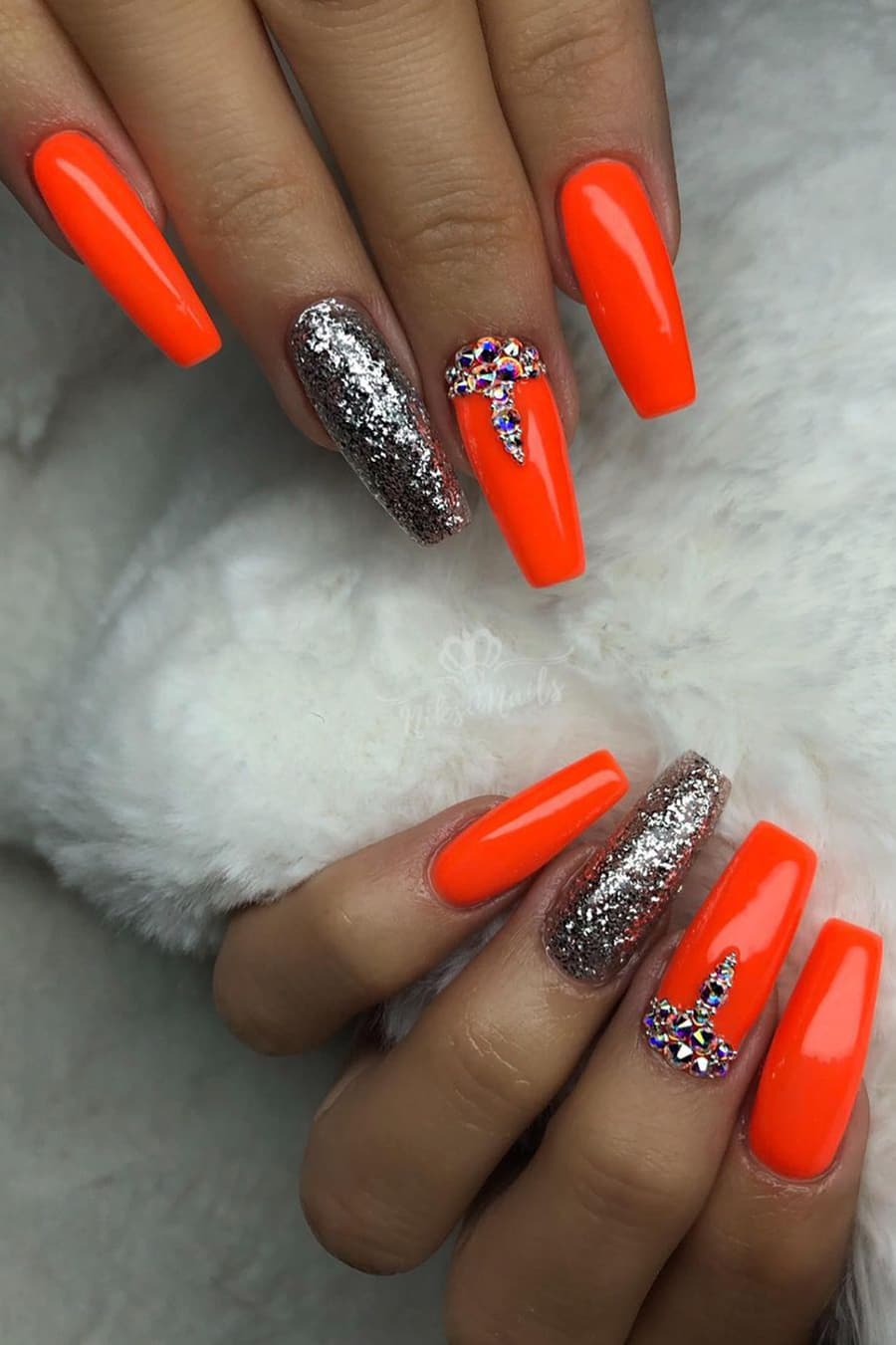 Orange and silver nails