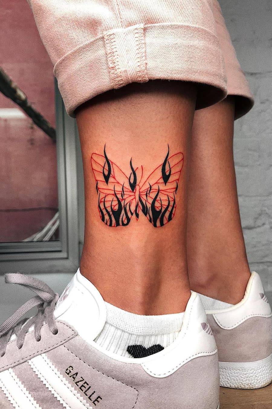 Red butterfly tattoo
