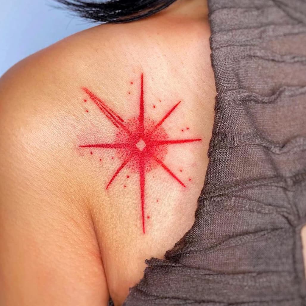 Red star tattoo