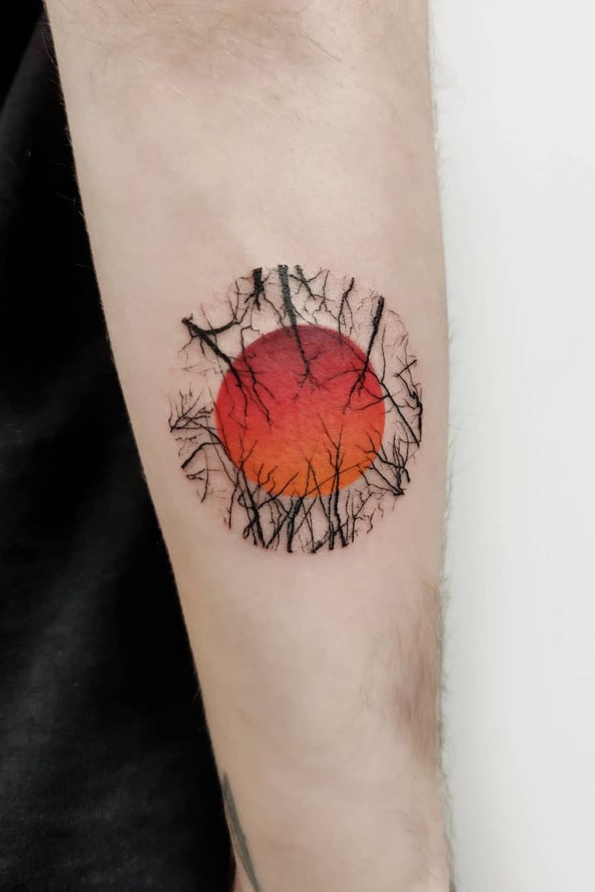 Red sun tattoo