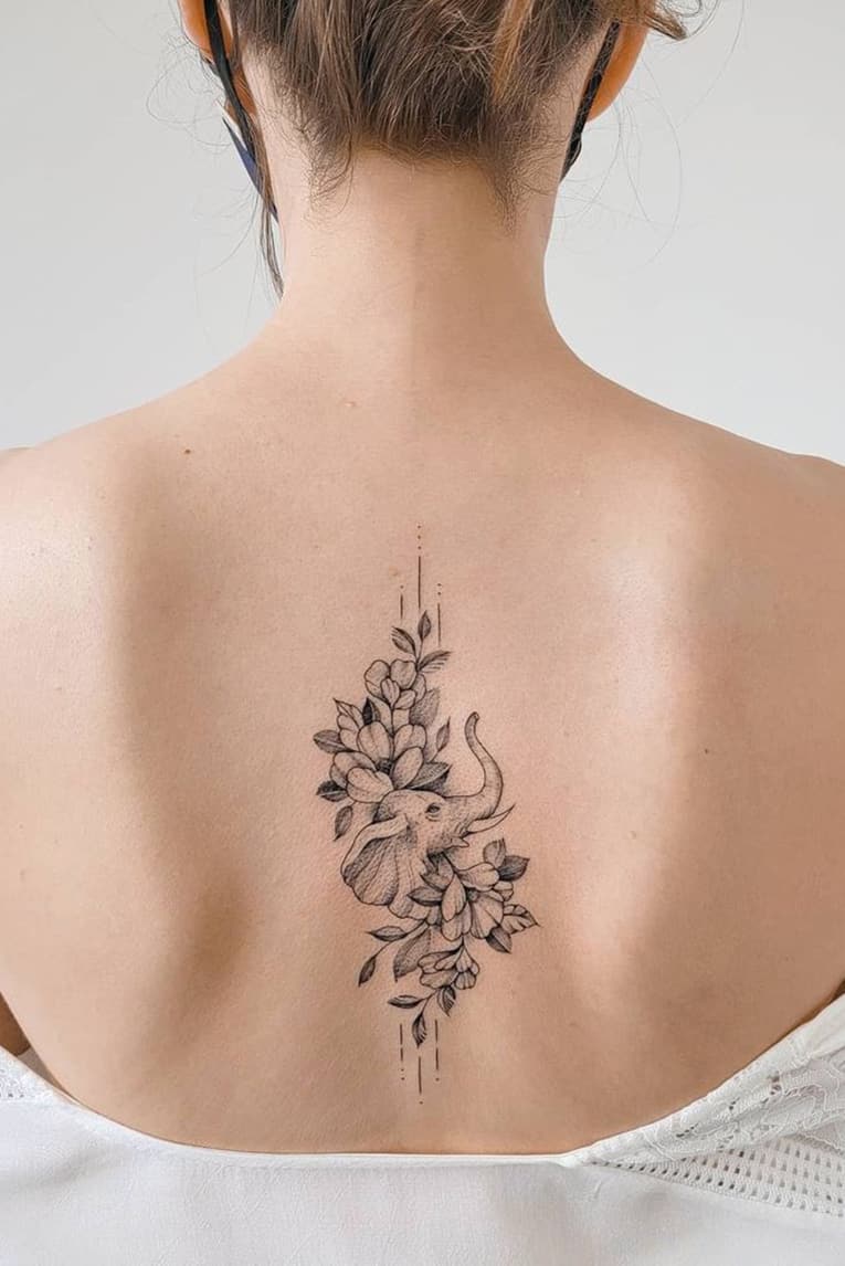 Simple flower elephant tattoo