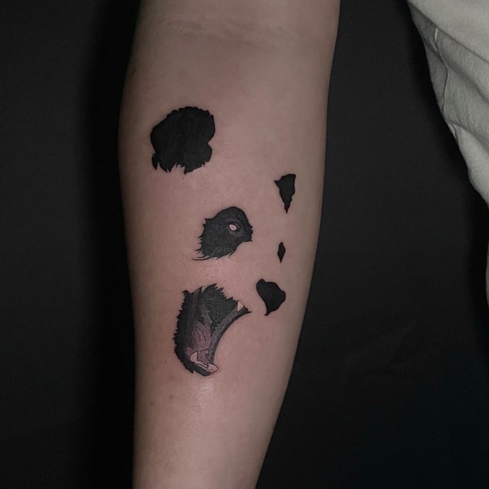 Abstract panda tattoo