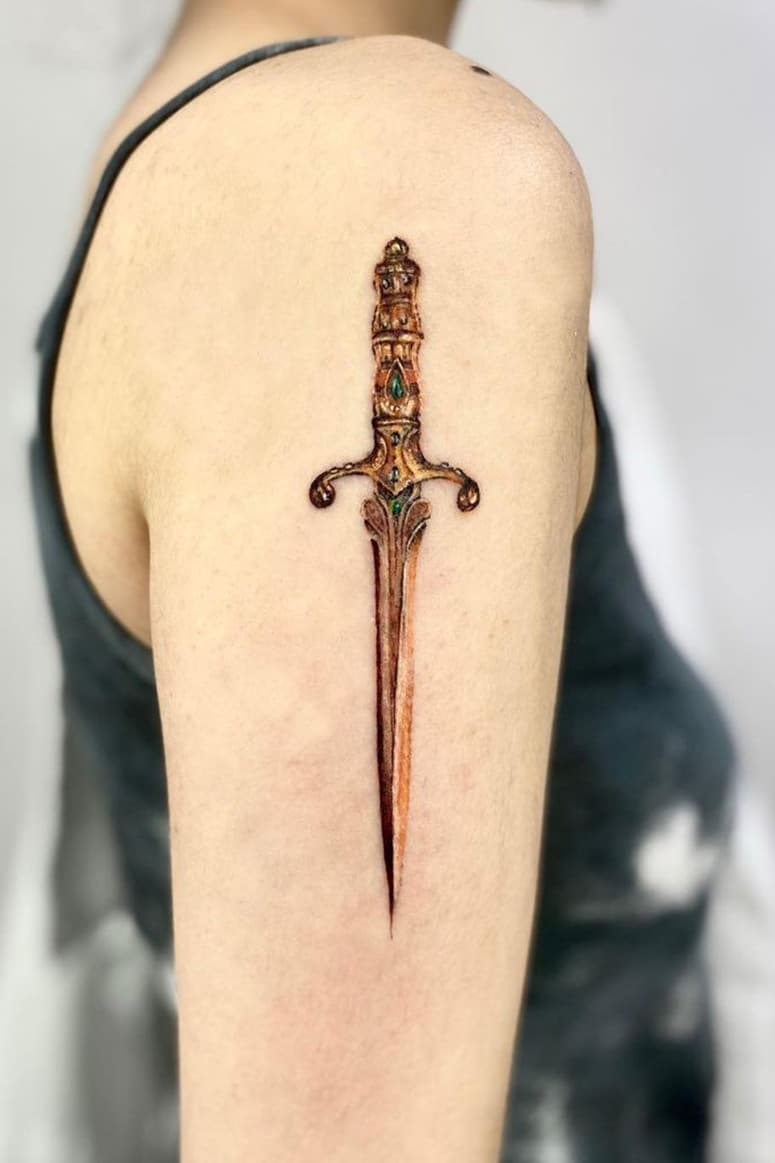 Antique sword tattoo