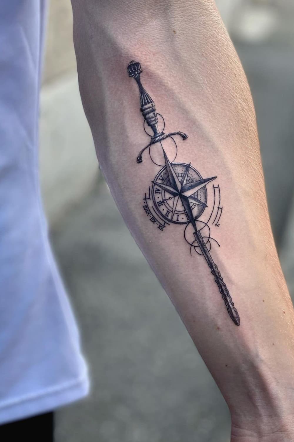 Compass sword tattoo