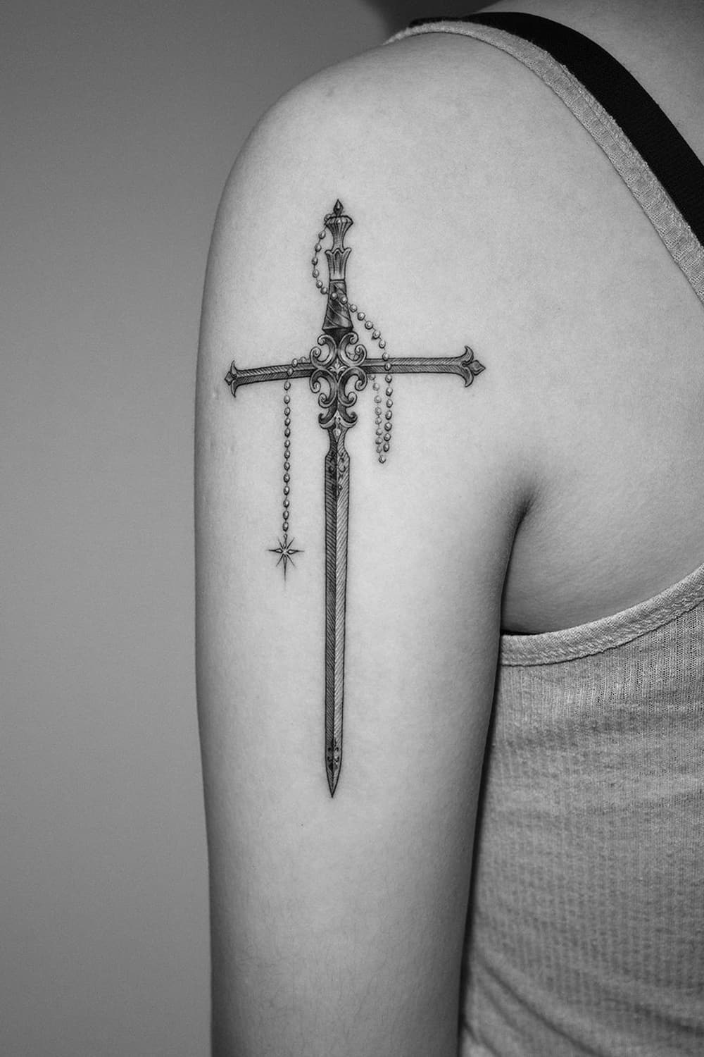 Decorative sword tattoo