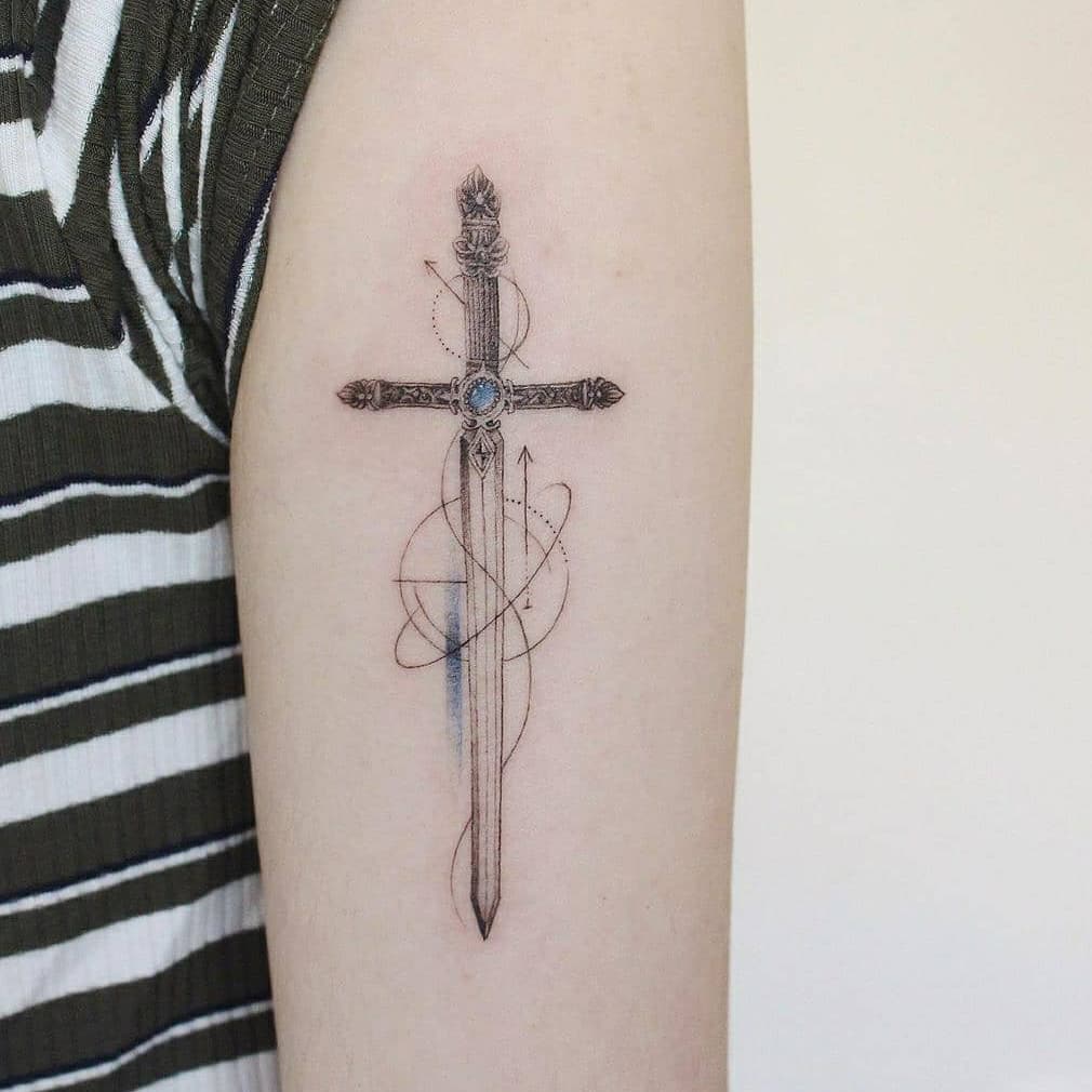 Geometric sword tattoo