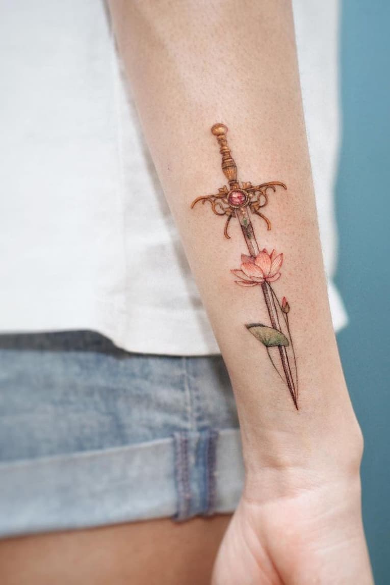 Lotus sword tattoo