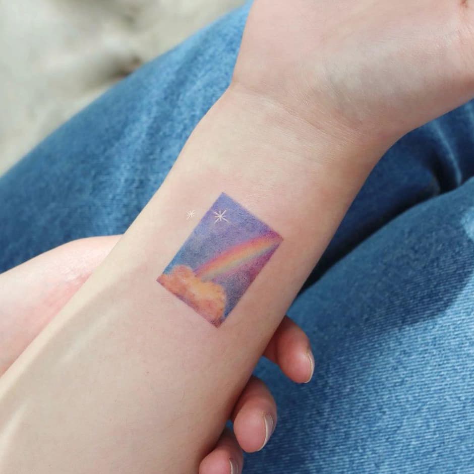 Rainbow landscape tattoo