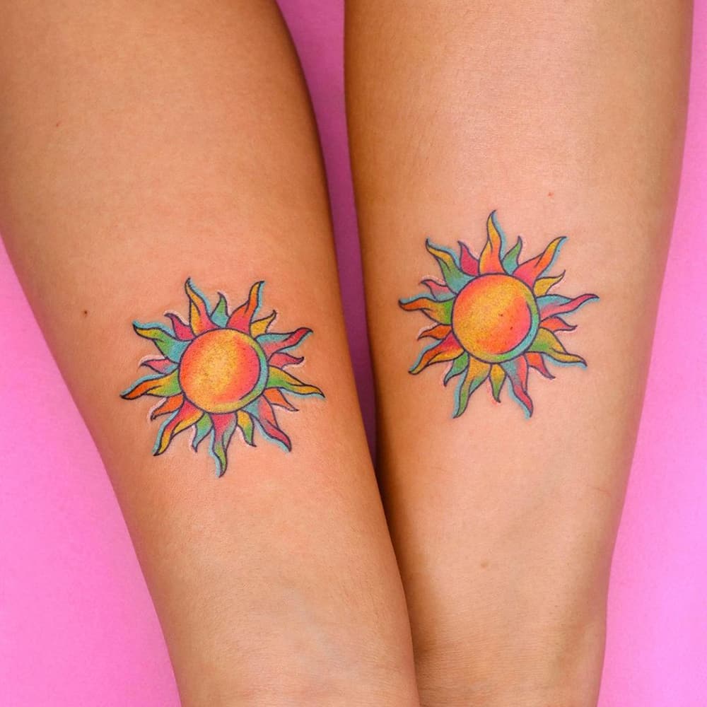 Rainbow sun tattoo