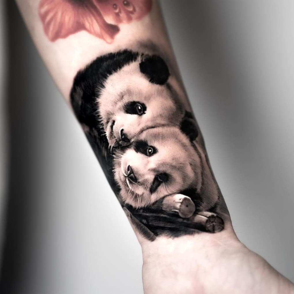 Realistic panda tattoo