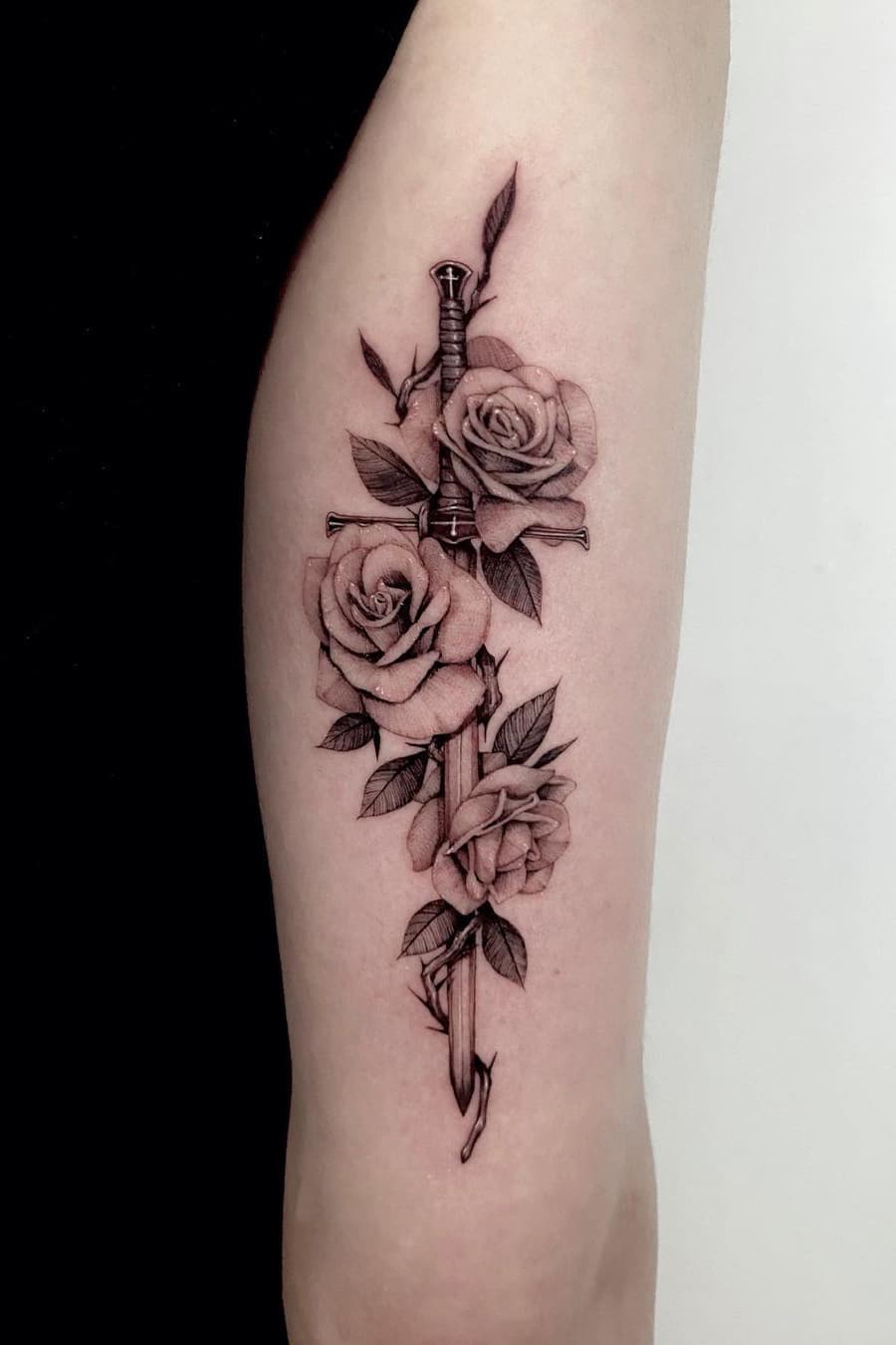 Rose sword tattoo