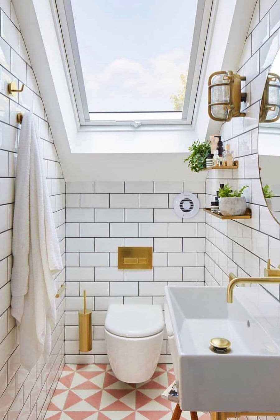 Small bathroom with golden color