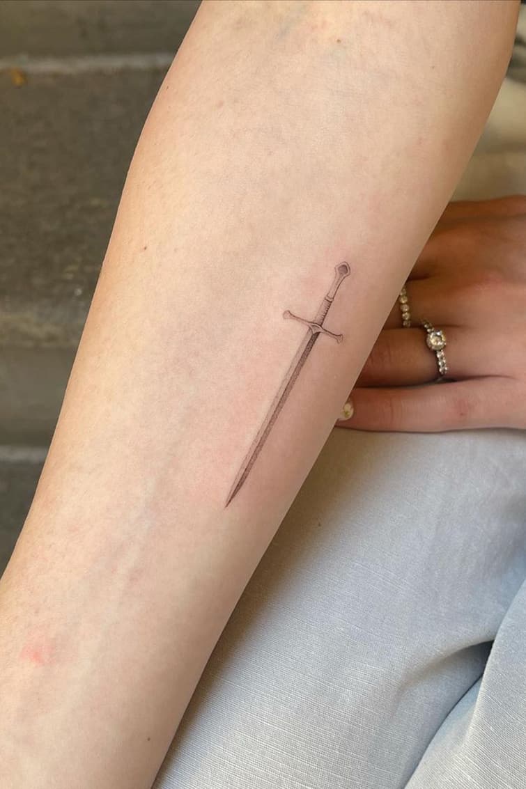 Sword small tattoo