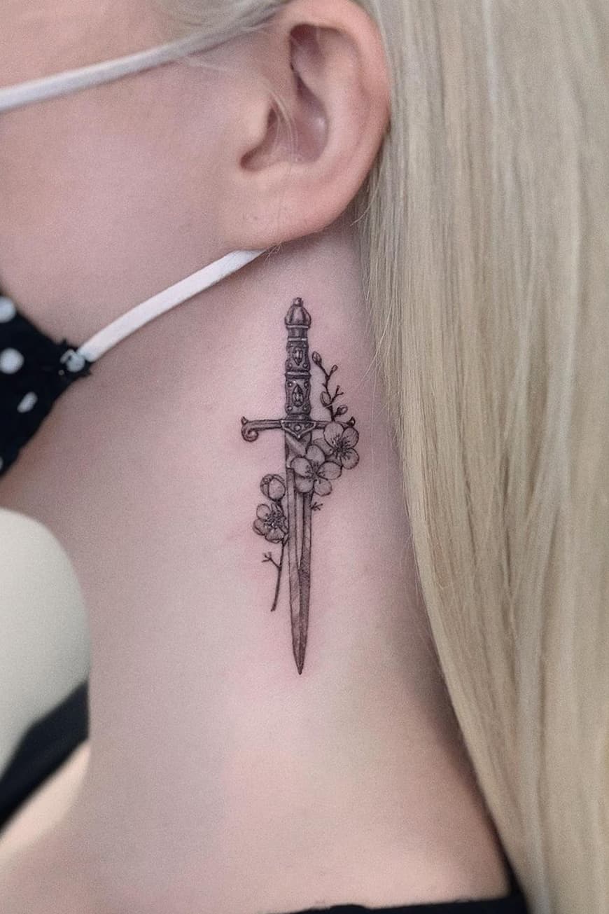Sword tattoo on neck