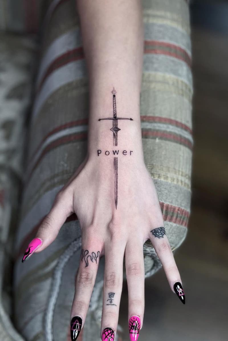 Sword tattoo on the hand