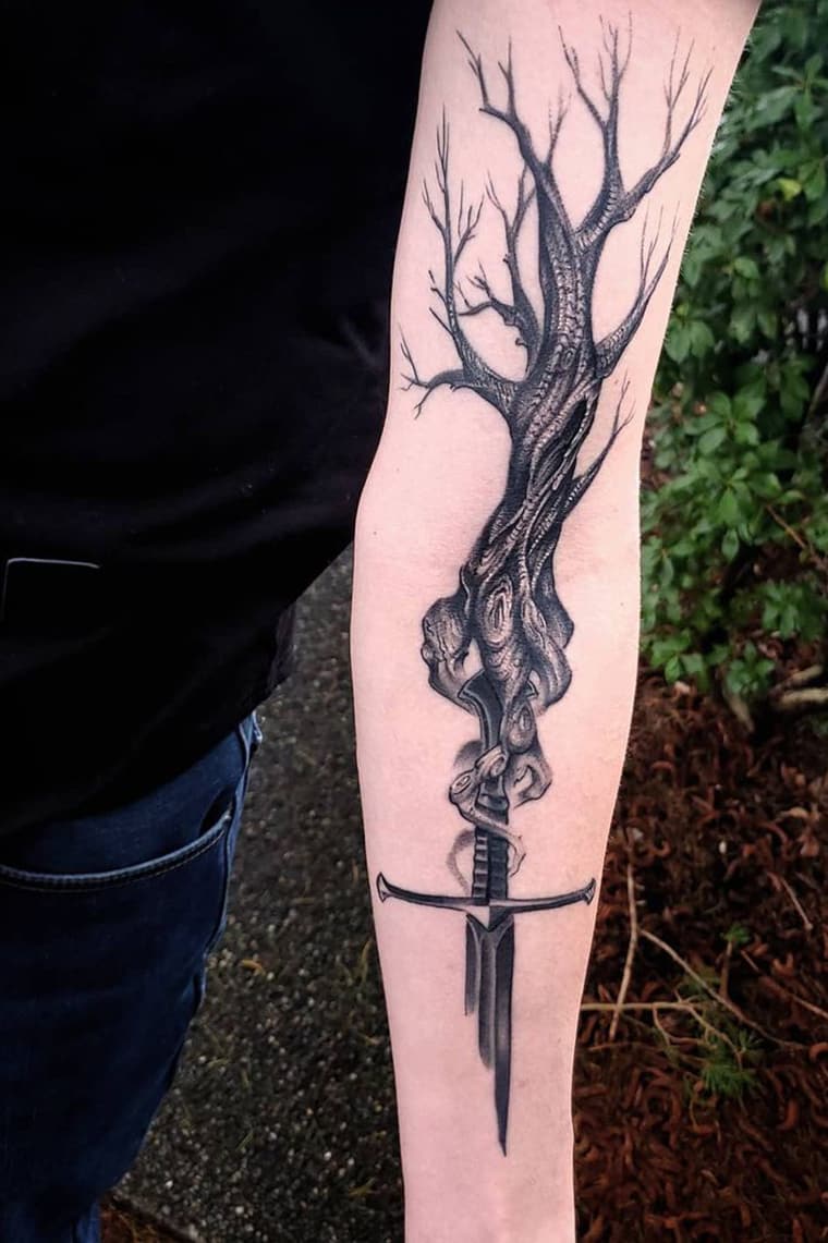 Tree sword tattoo