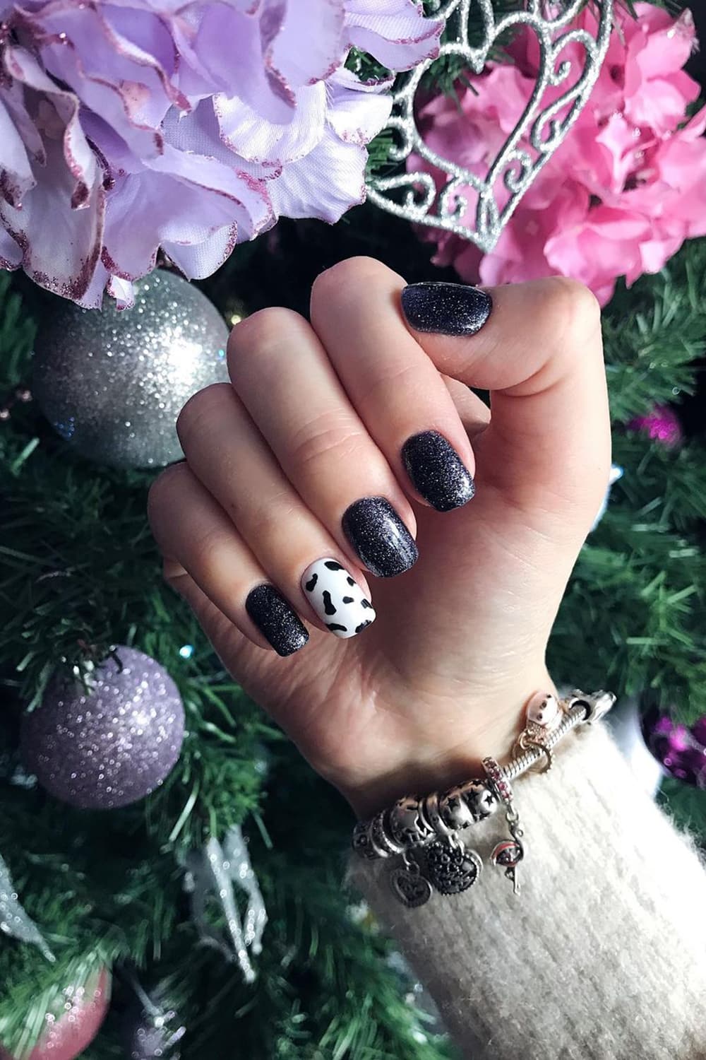Charming black cow print nails