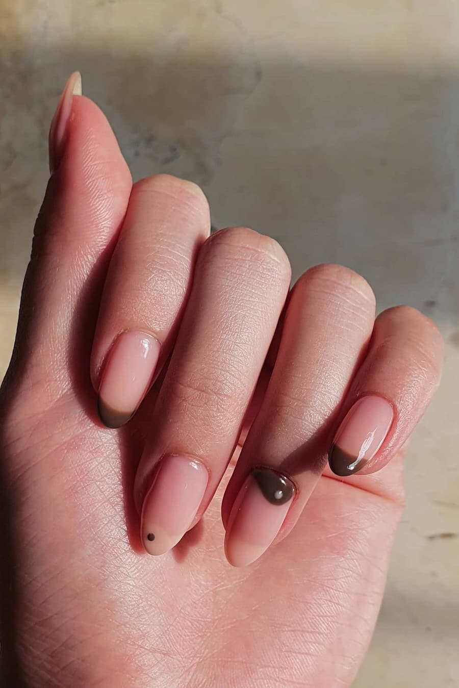 Minimalist yin and yang brown nails