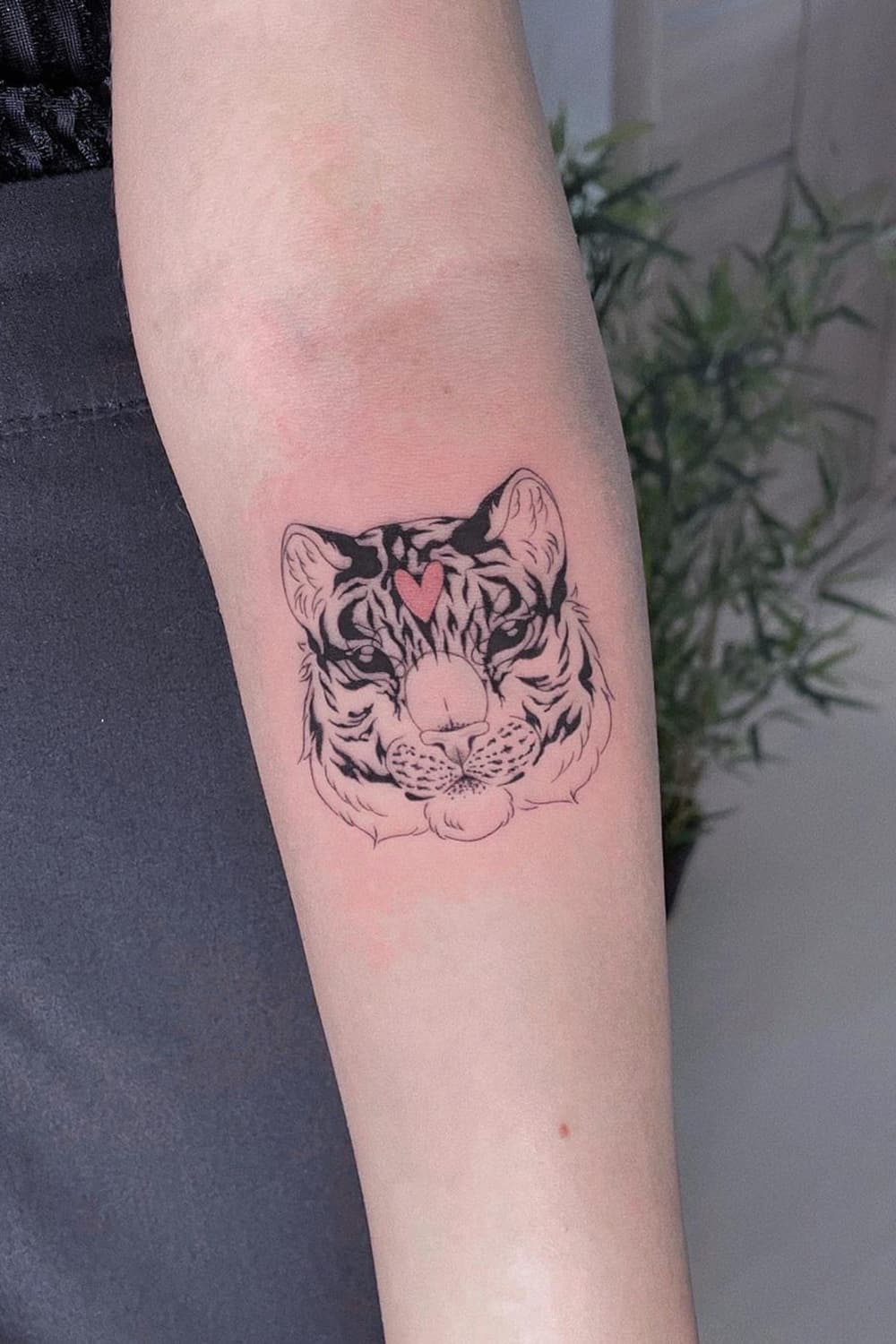 Tiger tattoo with heart