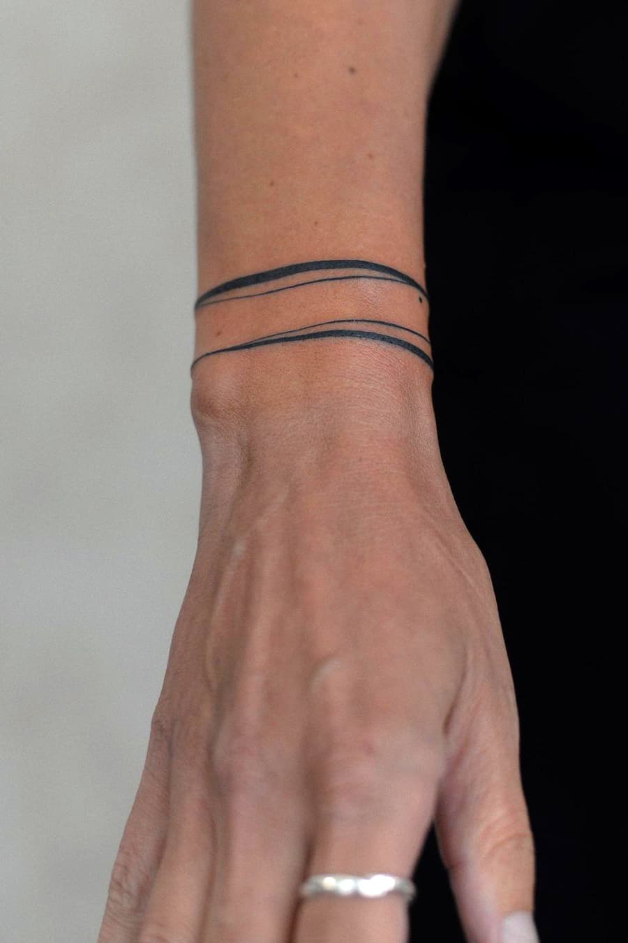 Abstract Parallel Line Bracelet Tattoo