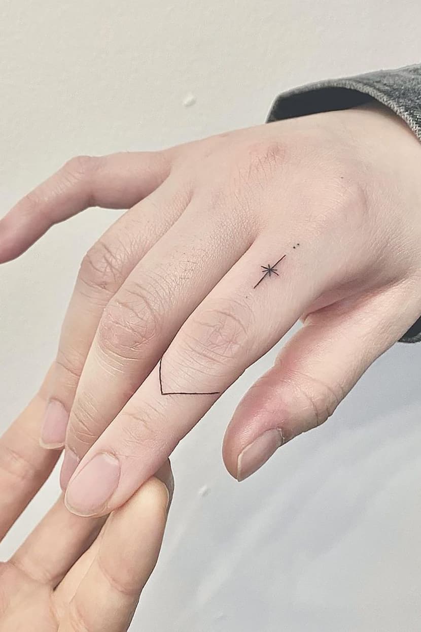 Arrow ring tattoo