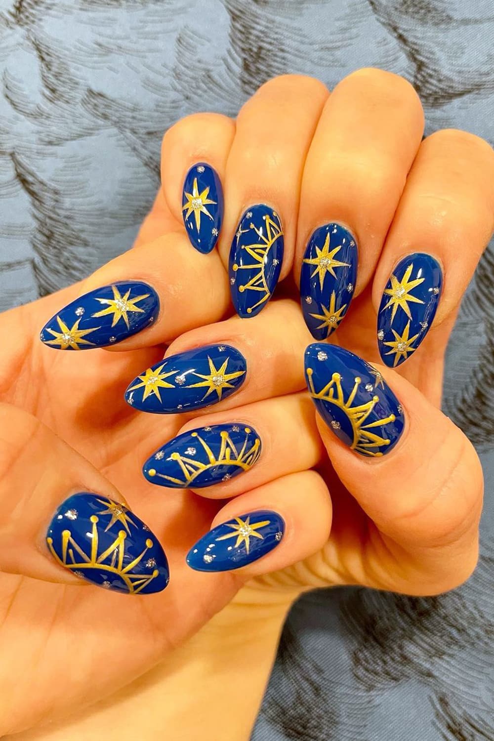 Blue celestial nails with sun