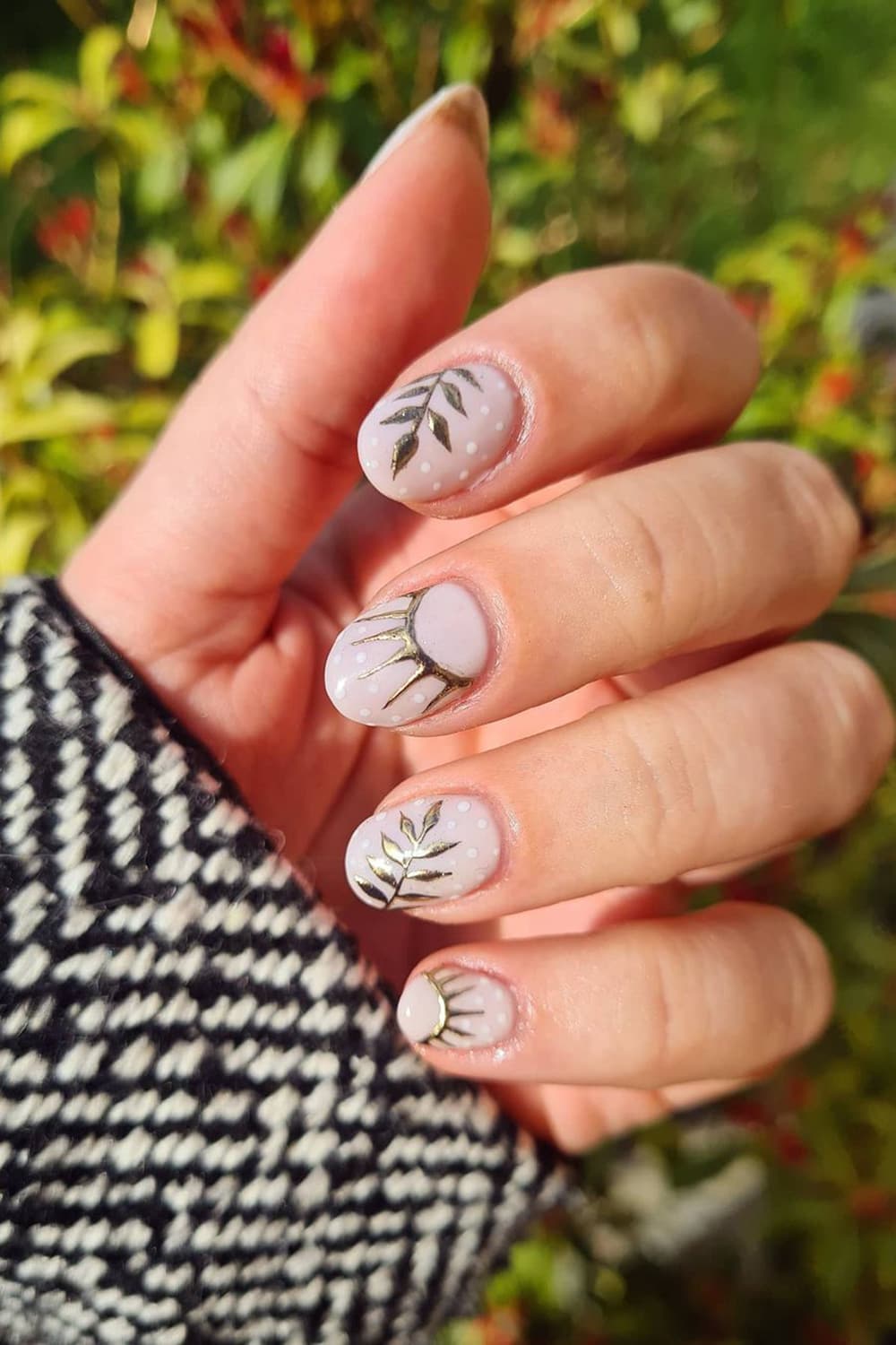 Elegant mixed nails with sun and plants