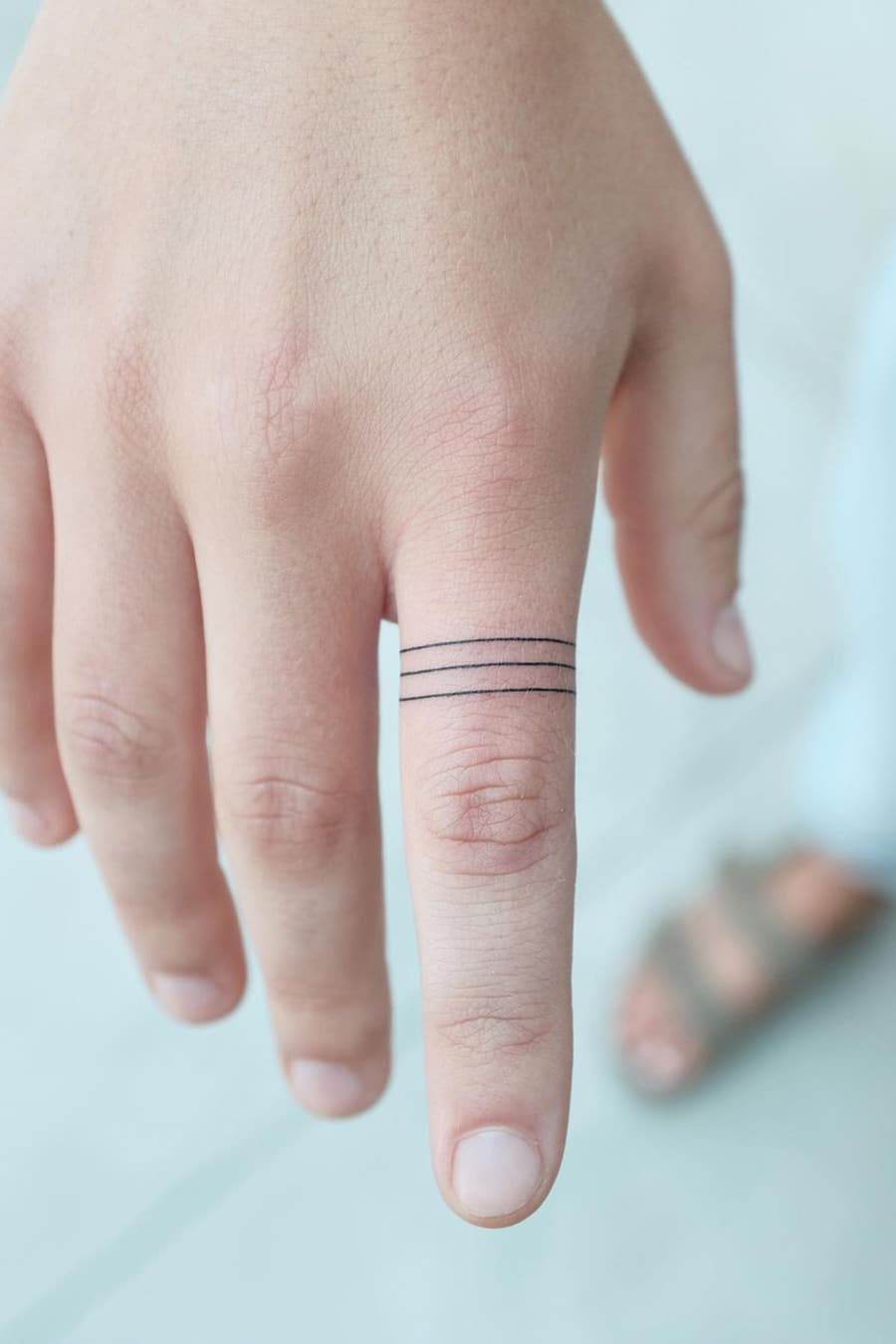 Family ring tattoo