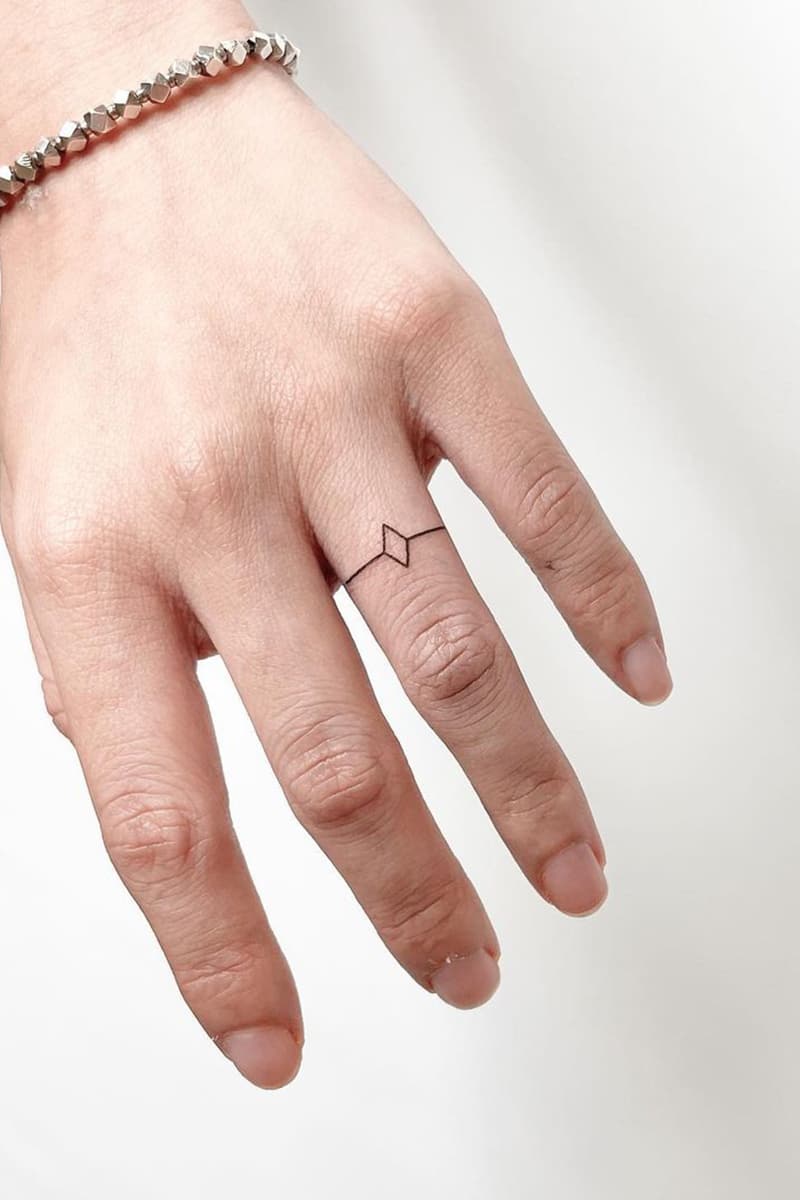 Geometric ring tattoo