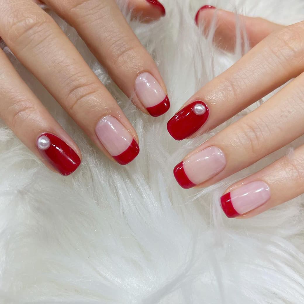 Gorgeous red nails with pearls