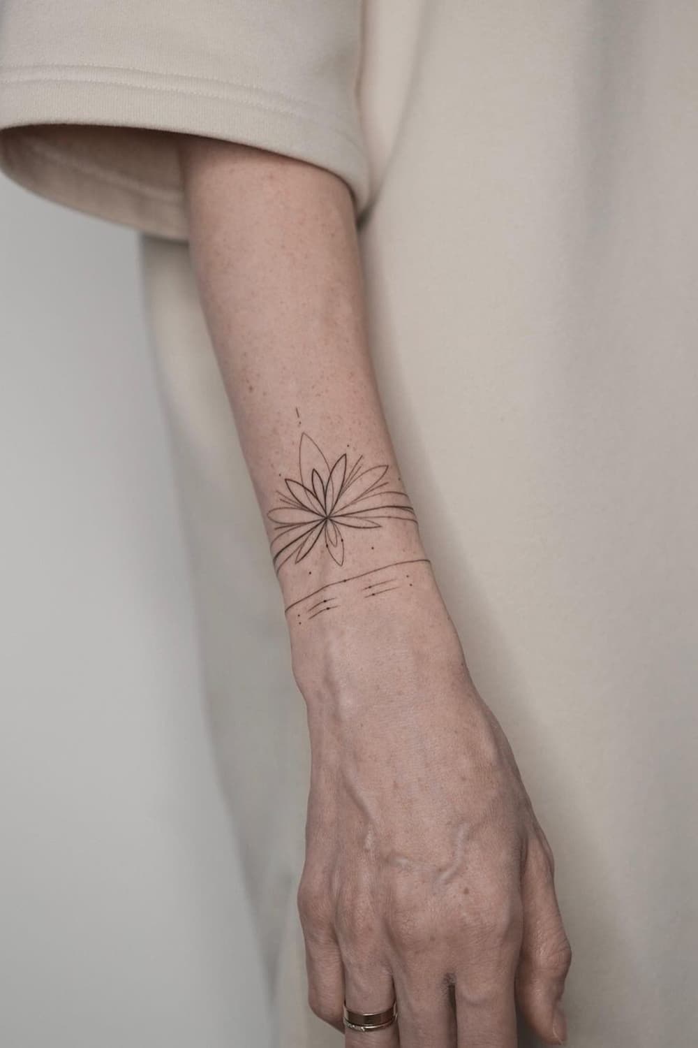 Lotus Bracelet Tattoo
