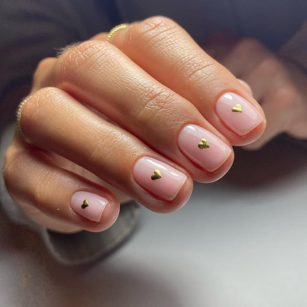 Minimalist gold leaf heart nails