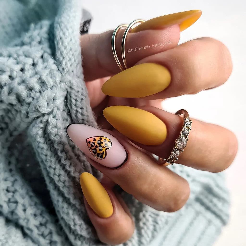 Printed heart yellow nails