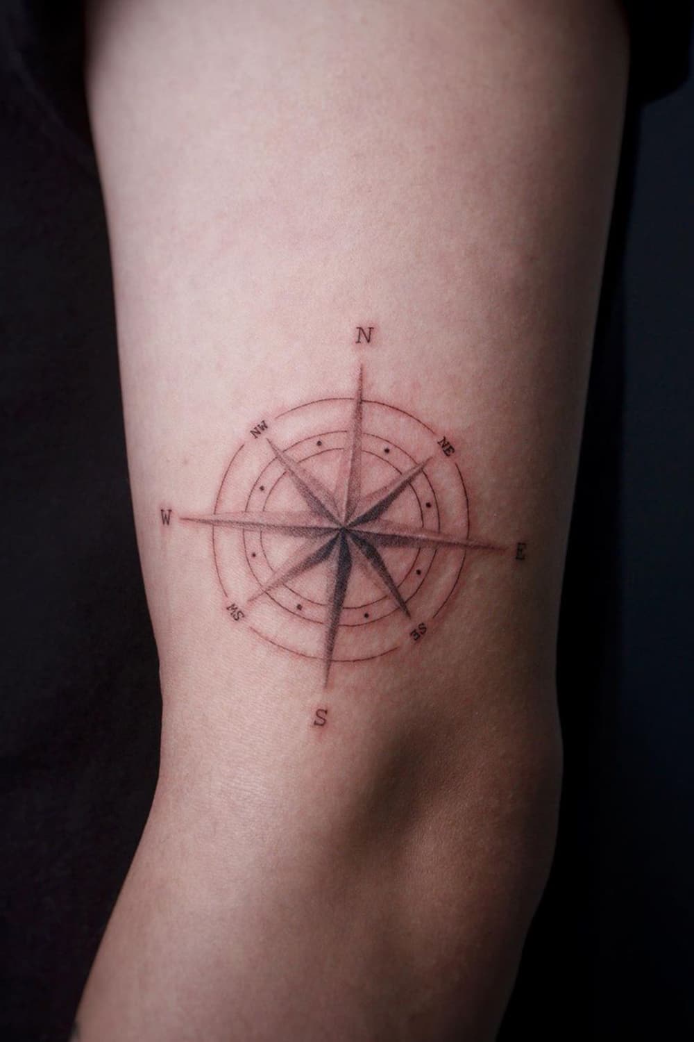 Simple compass tattoo