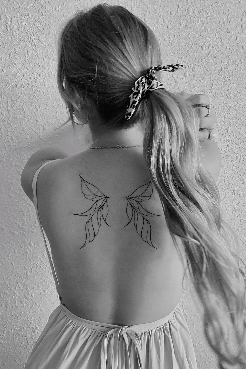 Wings Geometric Back Tattoo