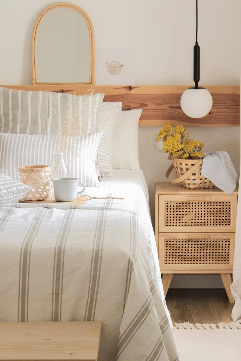 A rustic bedroom decorated with striped textiles