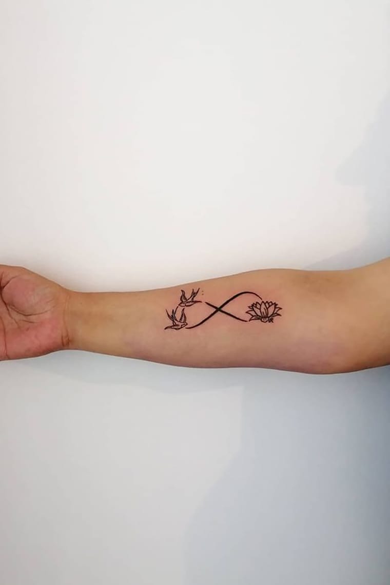 Bird and lotus infinity tattoo