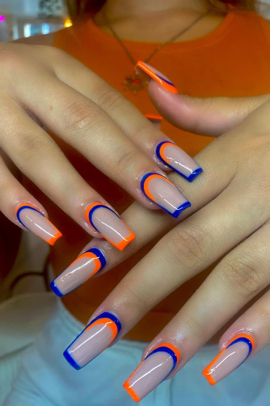 Blue and orange outline nails