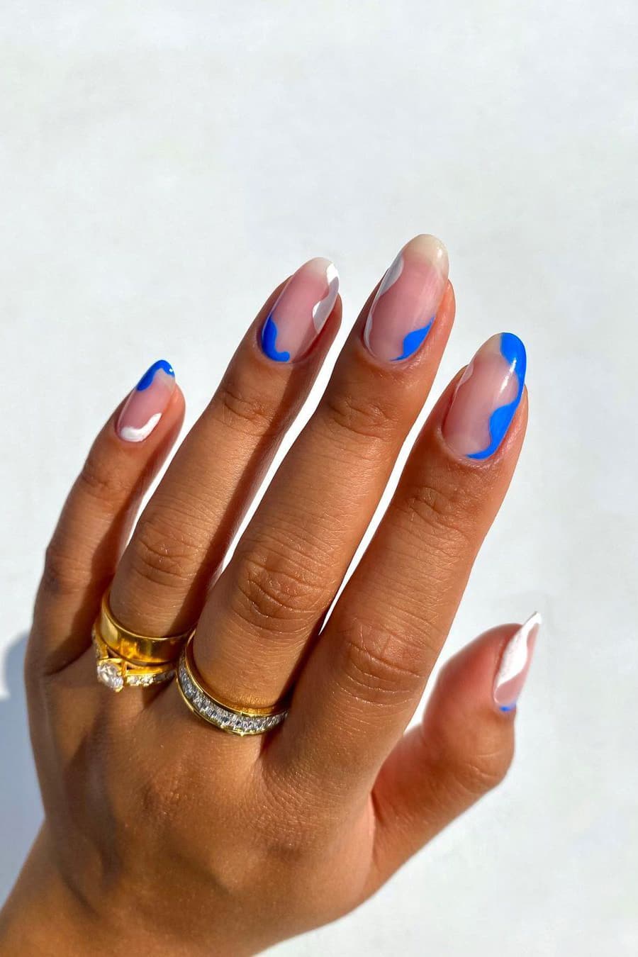 Bright blue and white combination nails