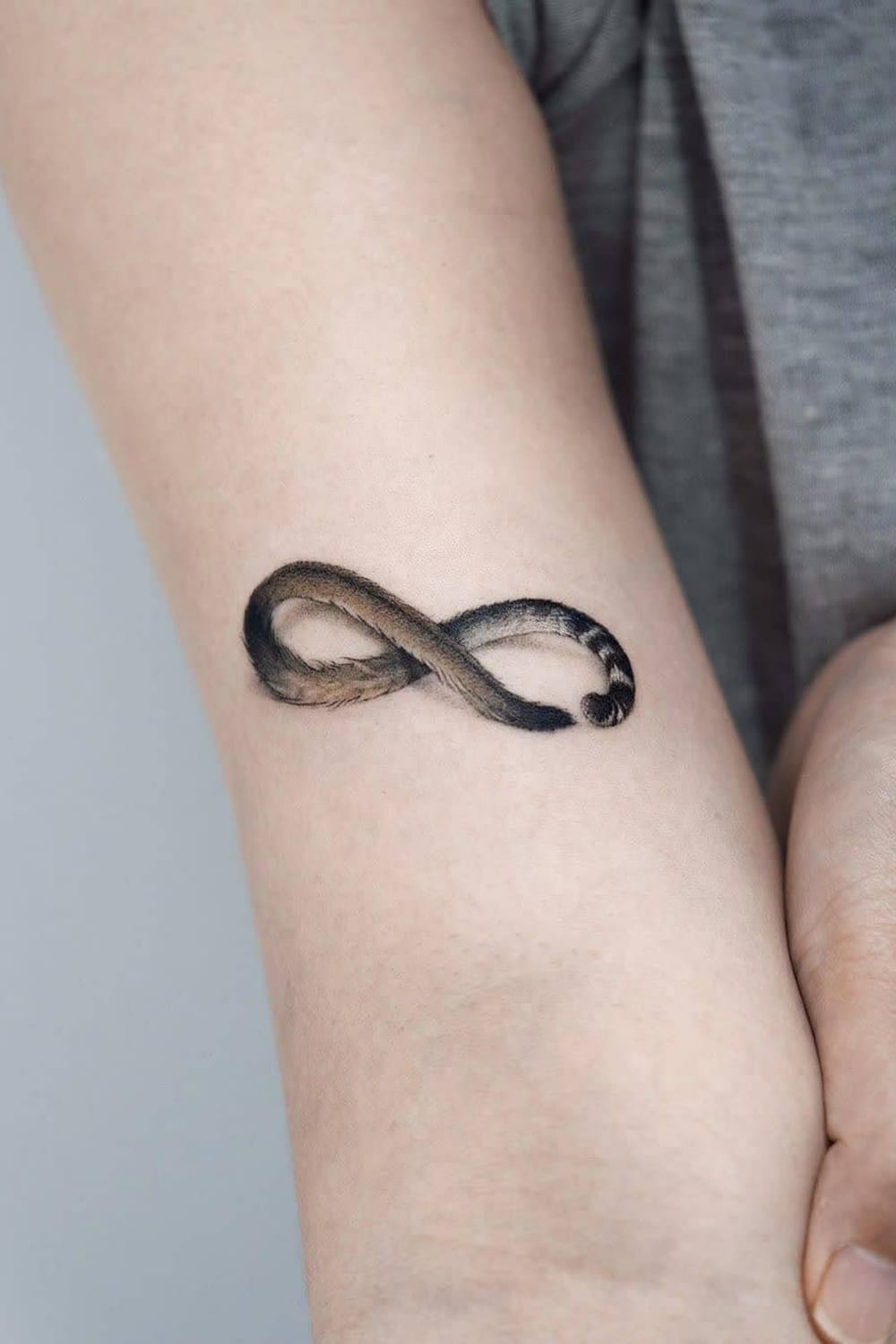 Cat tail infinity tattoo