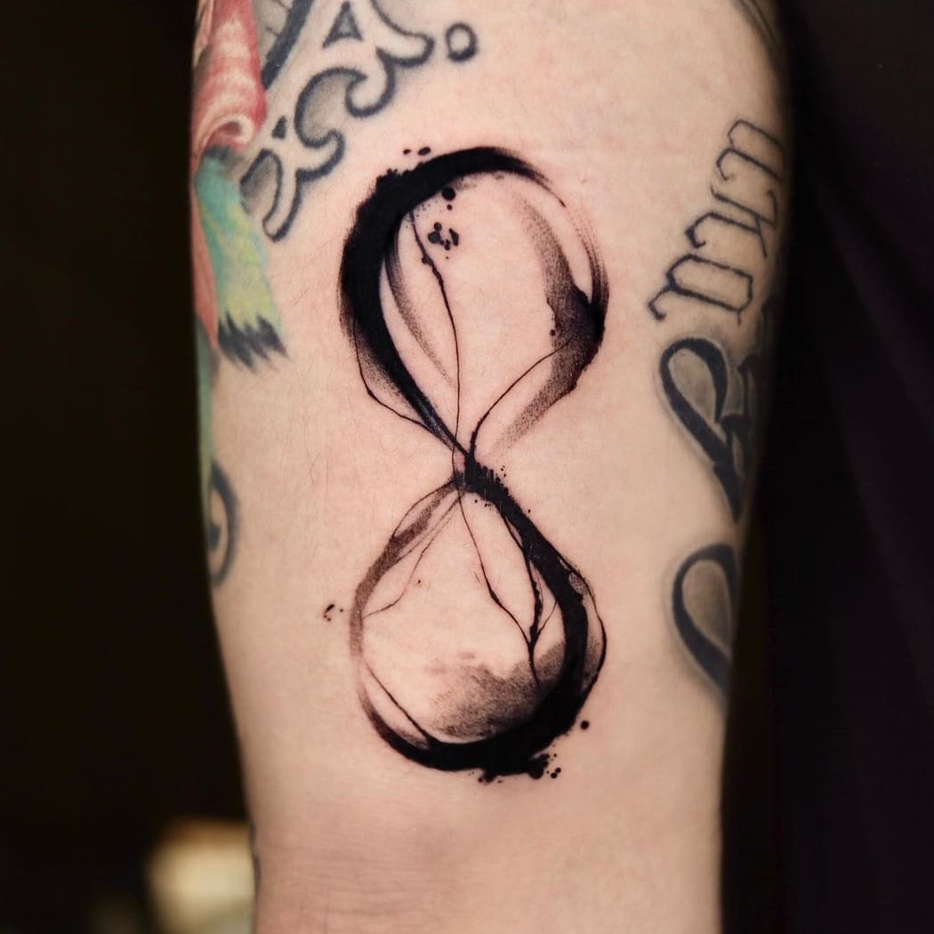 Cool black ink infinity tattoo